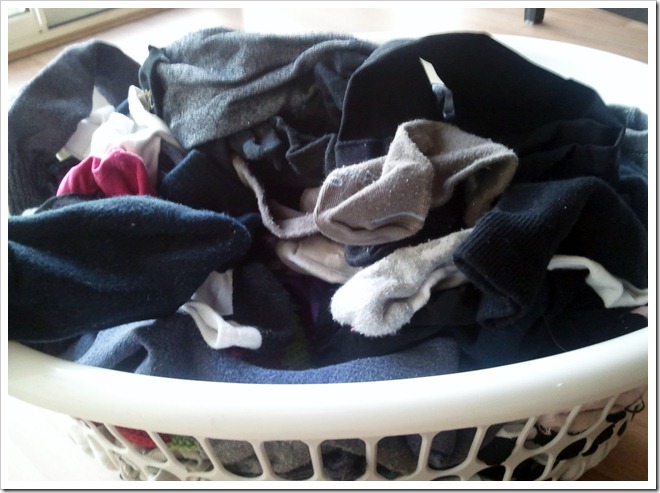 A laundry basket full of socks.