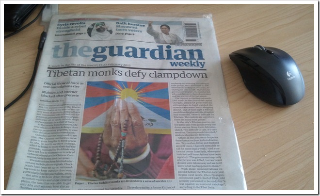 The Guardian Weekly, still in its wrapping, on my desk.